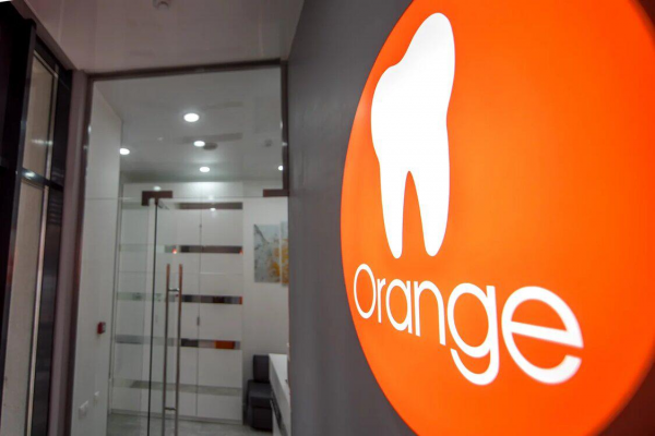Логотип компании Оранж Стоматология
